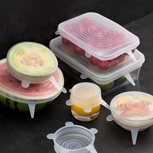 Set of silicone food covers on a dark surface