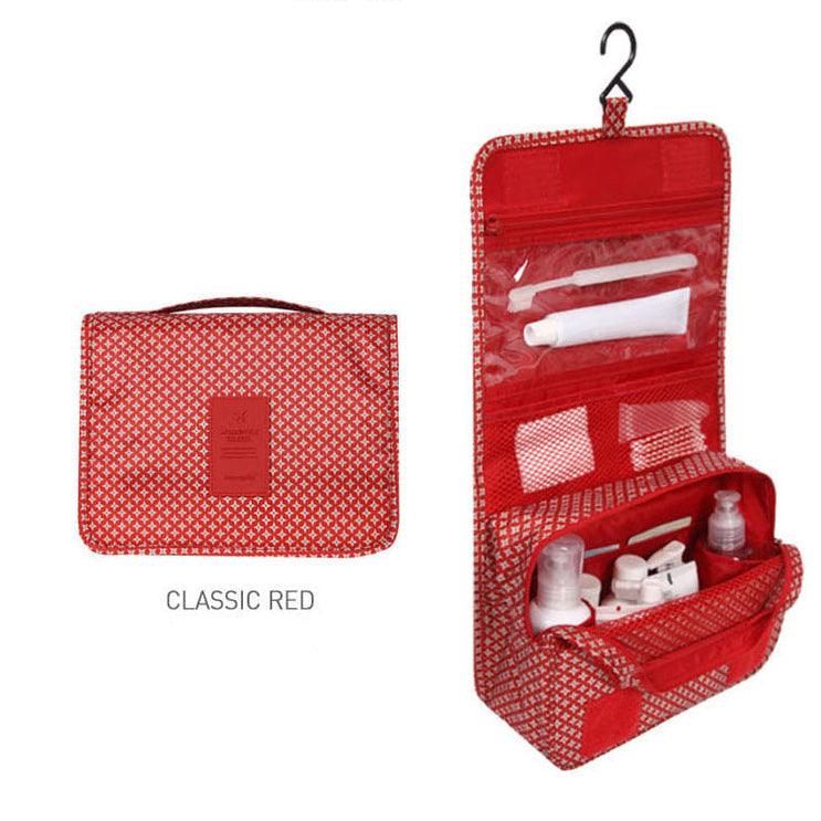 Red toiletry bag with products on a white background