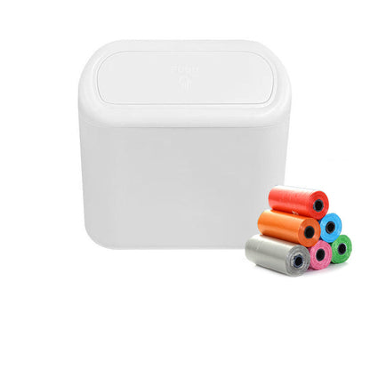 White trash bin with colorful bags on a white background