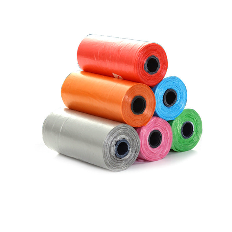 Stack of colorful rolls of plastic bags on a white background with text in red at the bottom.