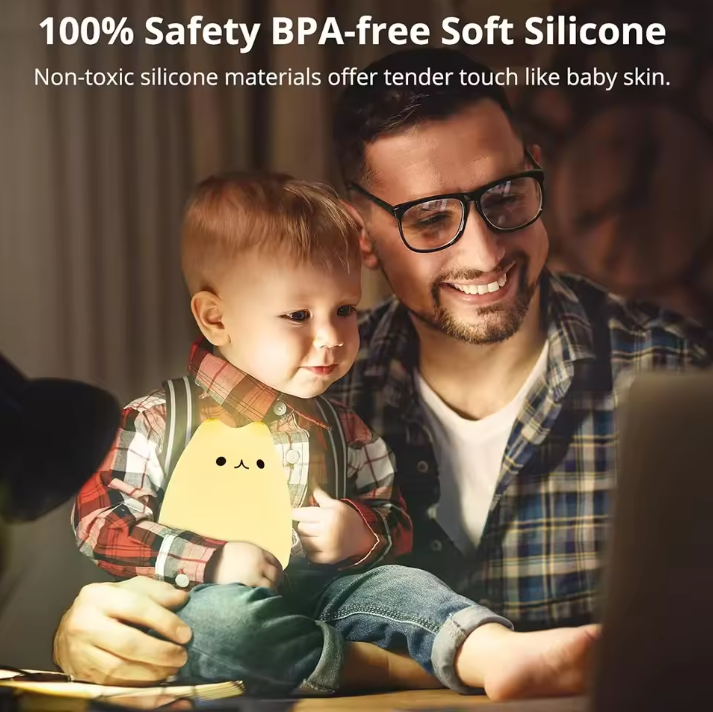 Man and child looking at a tablet with a focus on safety and non-toxicity of silicone materials.